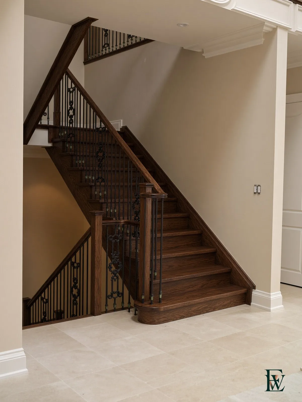 Oak stair treads rising from a stone-tiled foyer with an iron rail, frame 1 of 3, full foyer view, Ecowoods site work, Toronto.