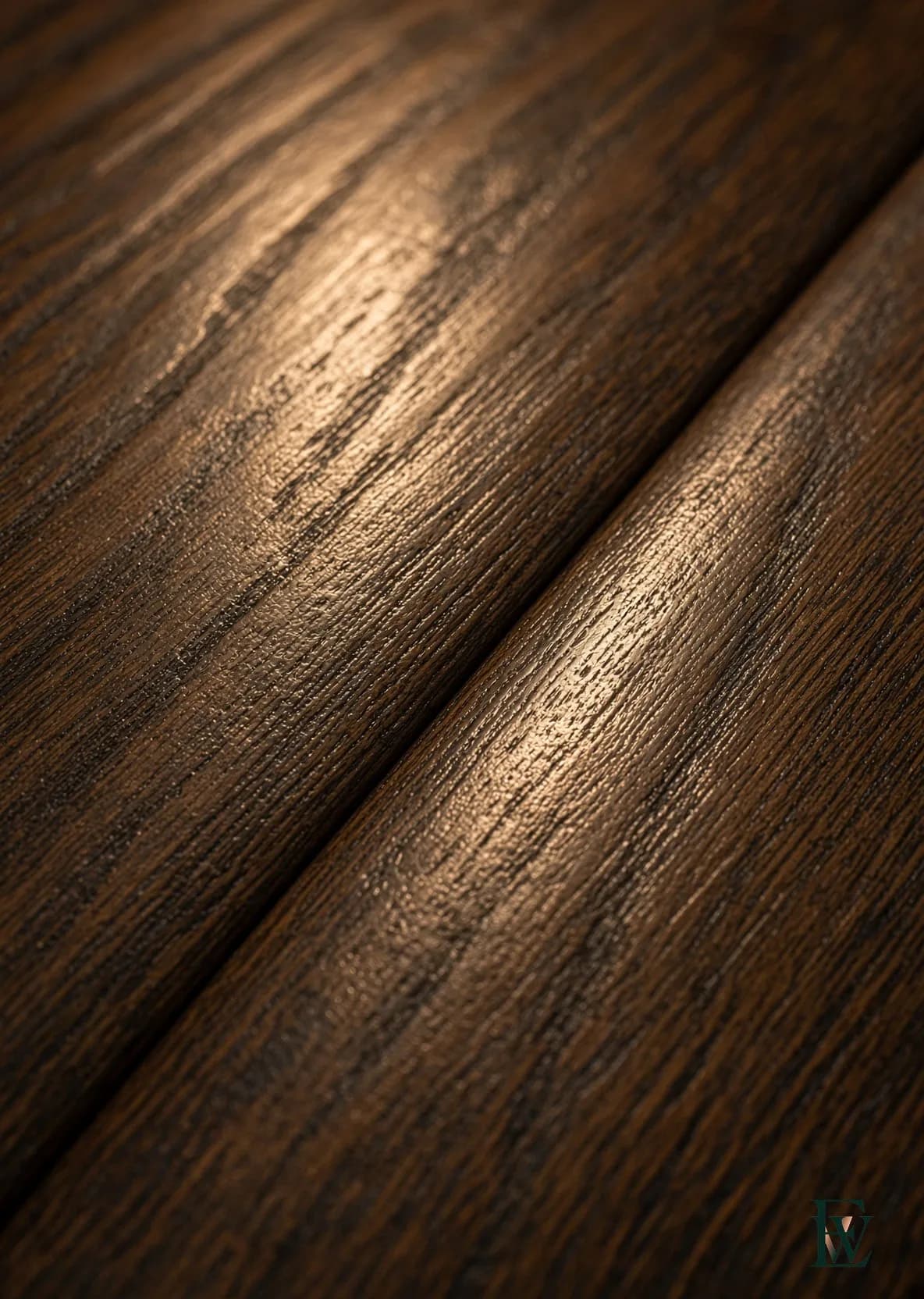 Dark oak salon floor, frame 3 of 3, macro of two boards and a joint under chandelier light, Ecowoods site work, Toronto.