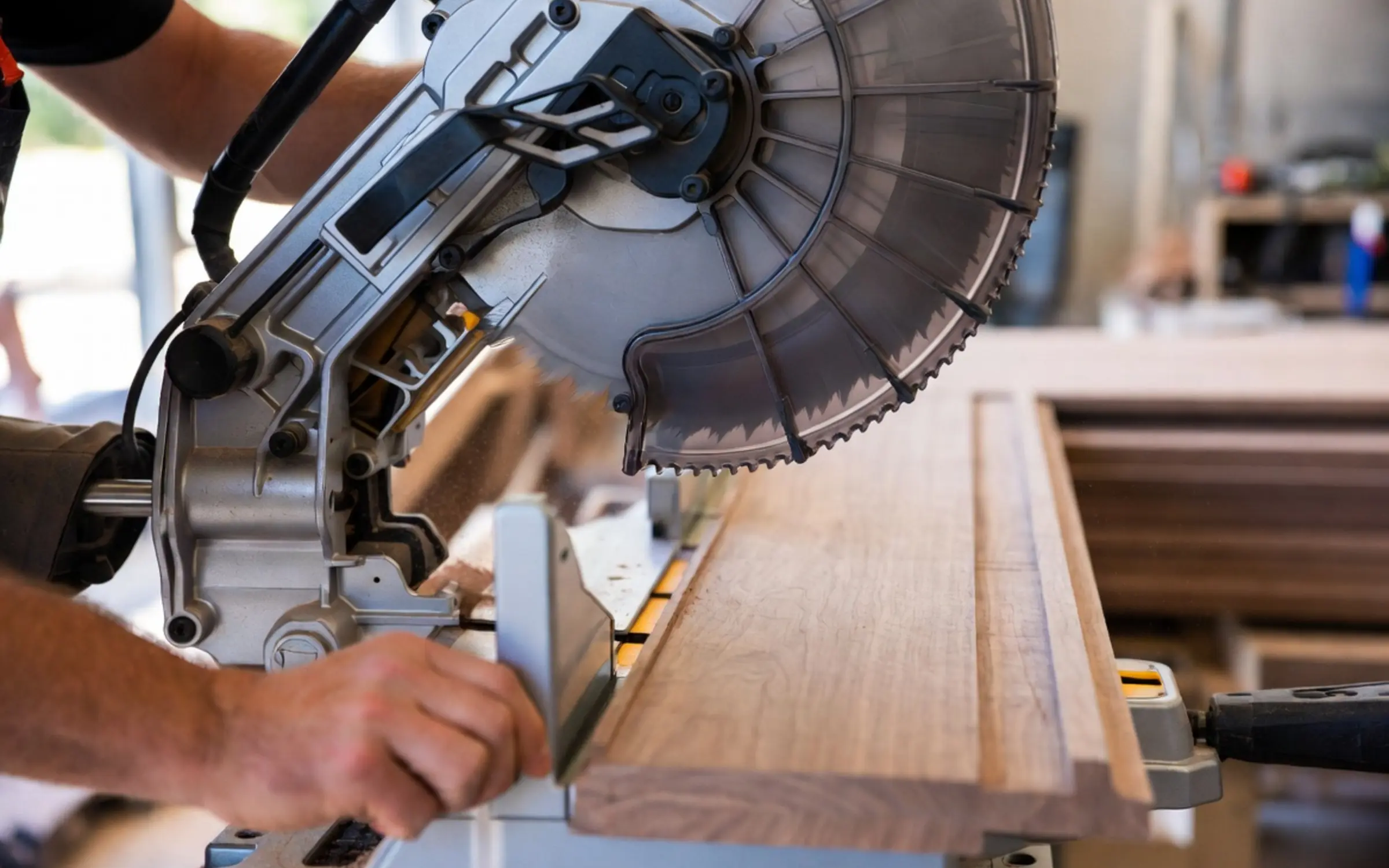 Compound miter saw cutting hardwood for a border or pattern